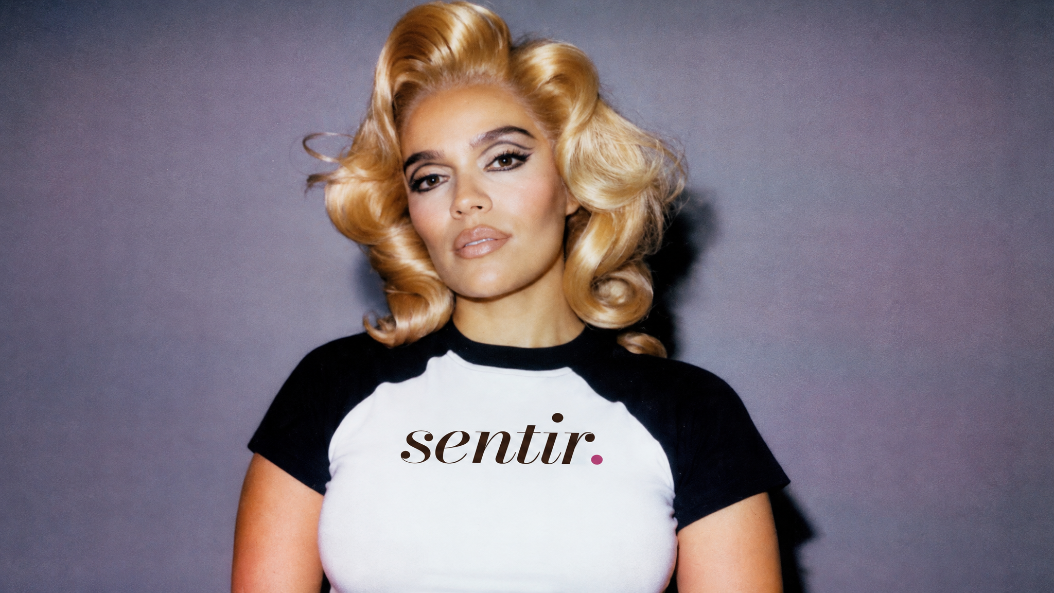 Portrait wearing a Sentir logo shirt